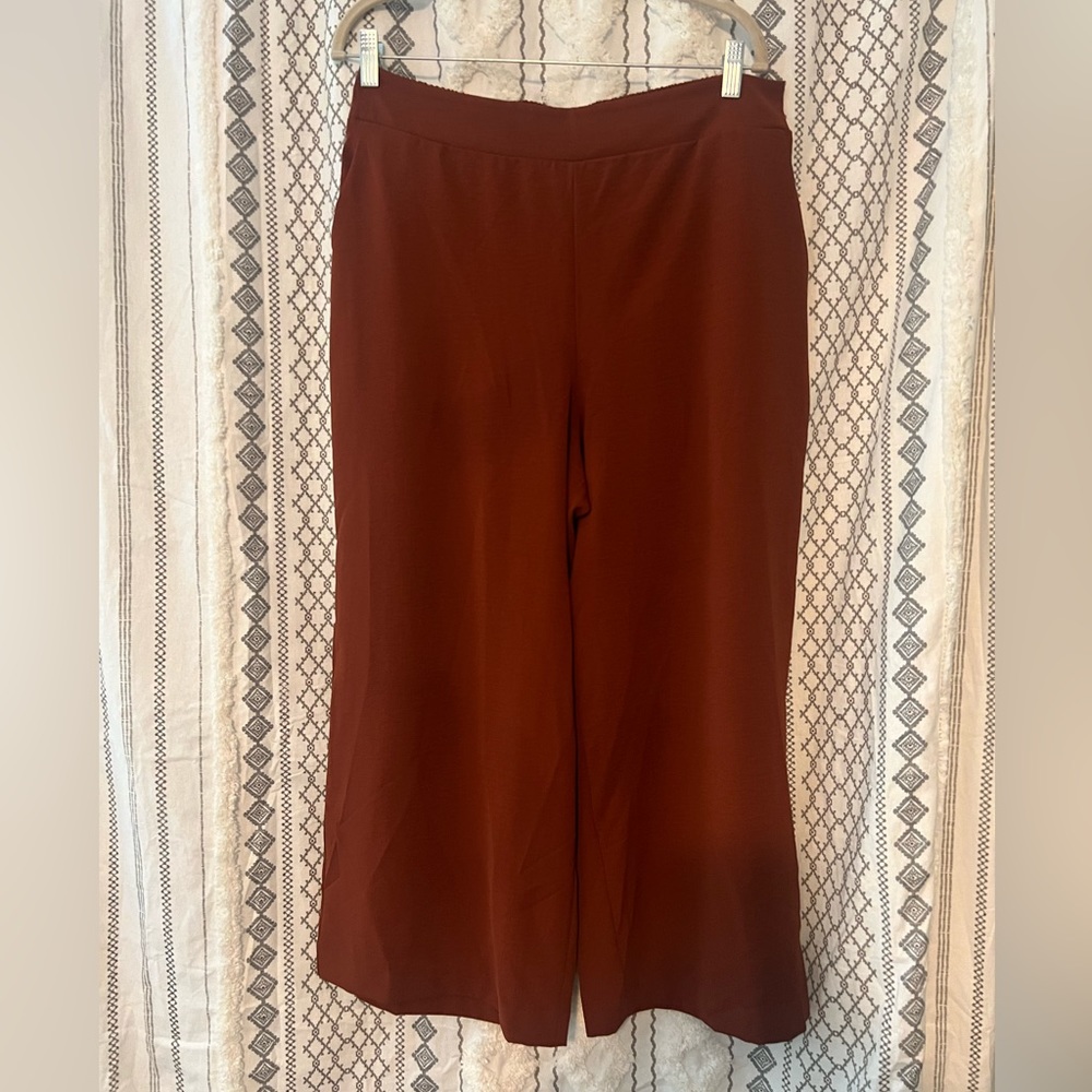 Burnt orange colored, ankle length, wide leg pants